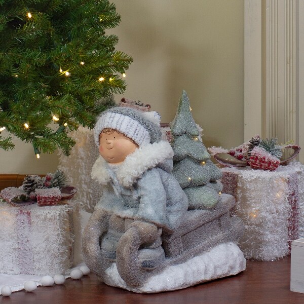 Lighted Boy on a Sled with Tree Christmas Decoration