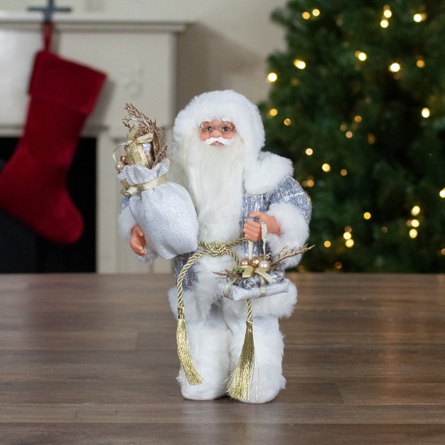 White And Gold Standing Santa Carrying A Full Sac Of Presents Christmas Figure