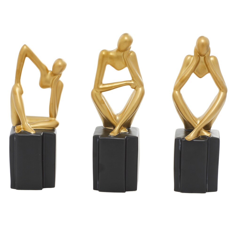 CosmoLiving by Cosmopolitan Silver or Gold Porcelain Sitting Thinker People Sculpture (Set of 3)