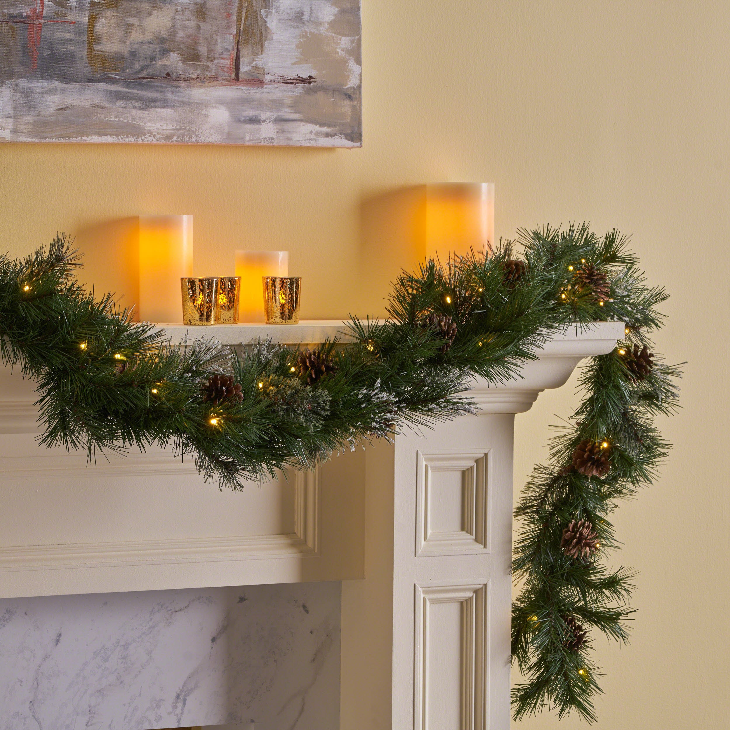 9-foot Mixed Spruce Pre-Lit Warm White LED Artificial Christmas Garland with Snowy Branches and Pinecones