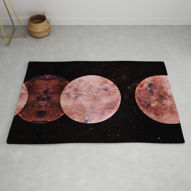 Emanuela Carratoni Autumnal Planets Rug Deny Designs