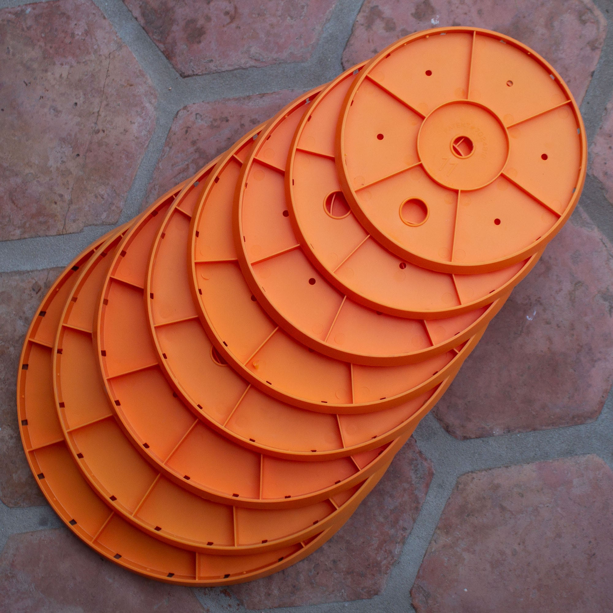 Bloem Ups-A-Daisy Round Planter Insert: 17" - Orange - Durable Resin Disk, Drainage Holes, Place Inside A Planter, Use Less Potting Soil, For Indoor & Outdoor Use, Gardening