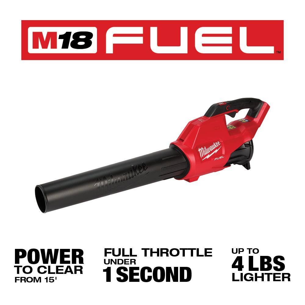 MW M18 FUEL Brushless Cordless 21 in. Dual Battery Self-Propelled Lawn Mower w Blower  (2) 12.0Ah Batteries 2823-22HD-2724-20