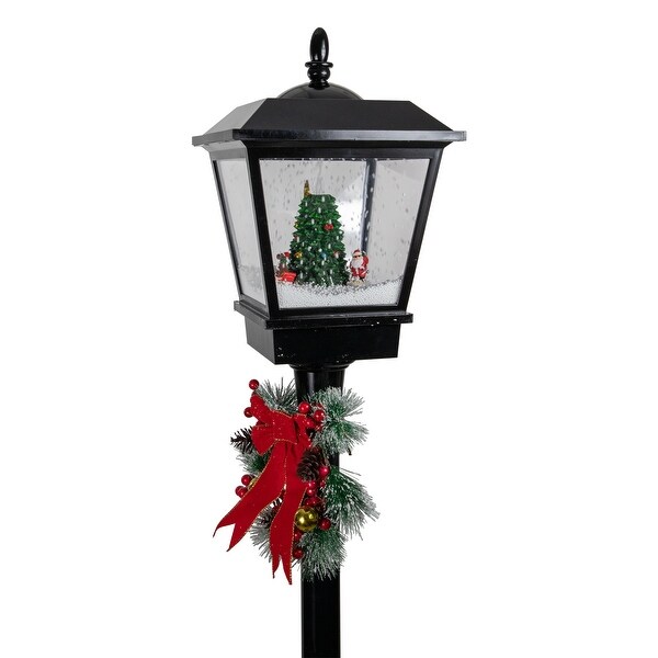 70.75 Lighted Musical Snowing Santa and Friends Christmas Street Lamp