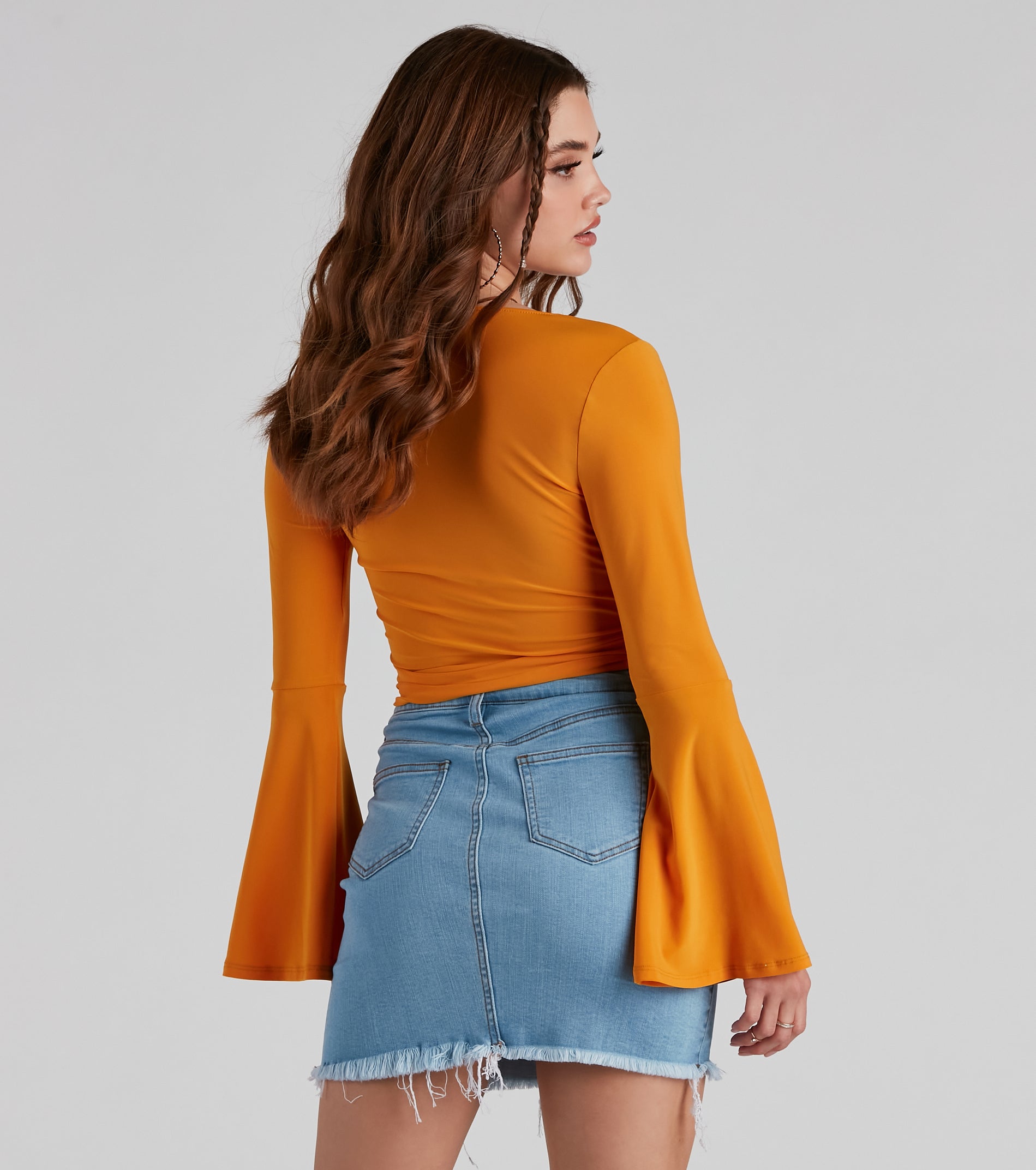 Wrapped In Chic Bell Sleeve Top