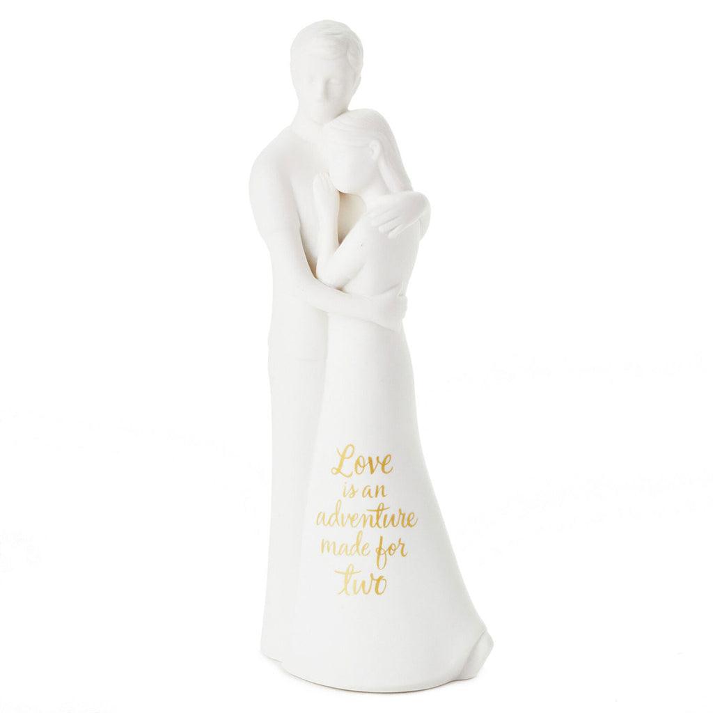 Hallmark  Love Is an Adventure Embracing Couple Figurine, 8.75