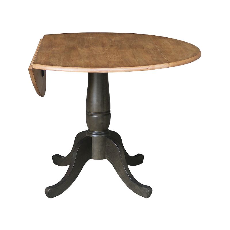 International Concepts Pedestal Round Dual Drop Leaf Dining Table