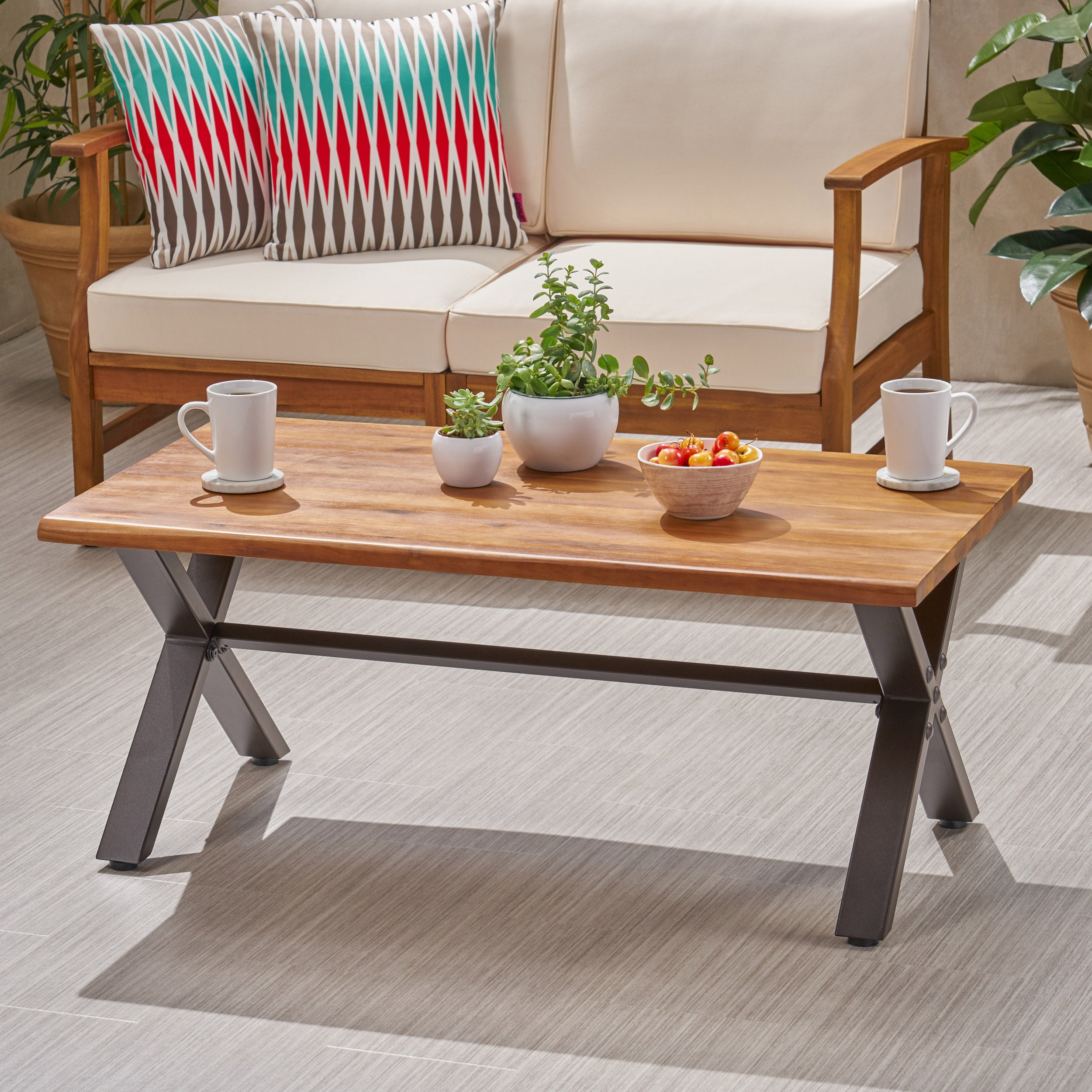 Ishtar Outdoor Farmhouse Teak Acacia Wood Coffee Table with Black X-Frame Legs