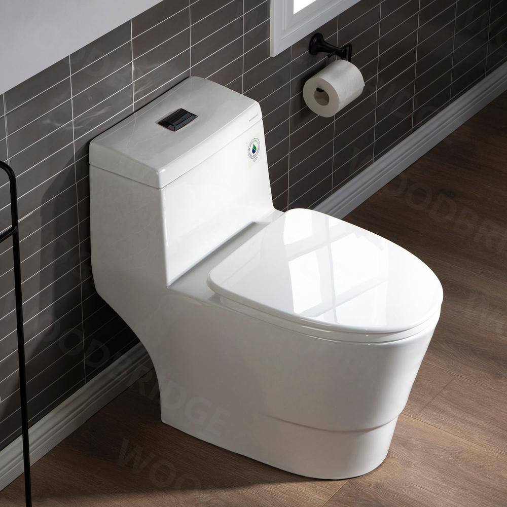 WOODBRIDGE Everette 1-piece 1.1 GPF  1.6 GPF Dual Flush Elongated Toilet in White with Seat Included and Oil Rubbed Bronze Button HB0940-ORB