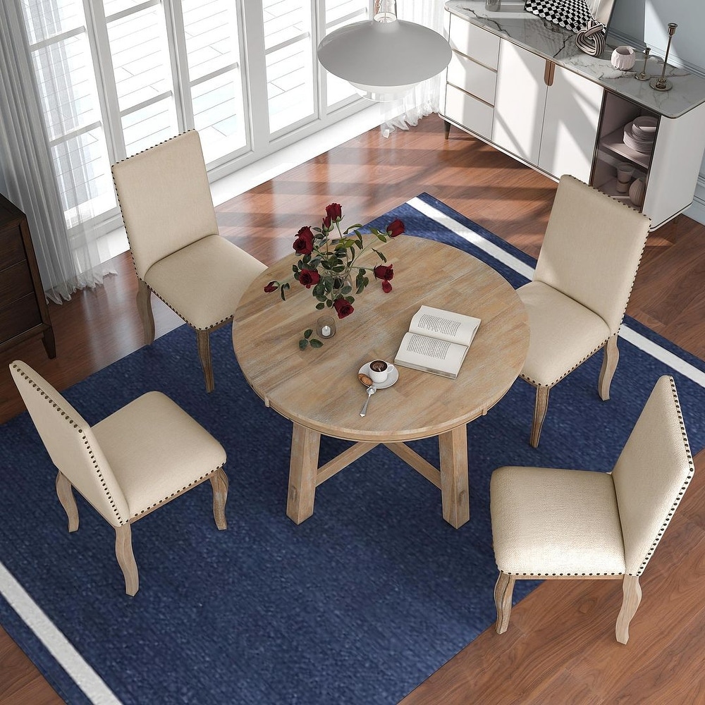 Expandable round dining table set for 4