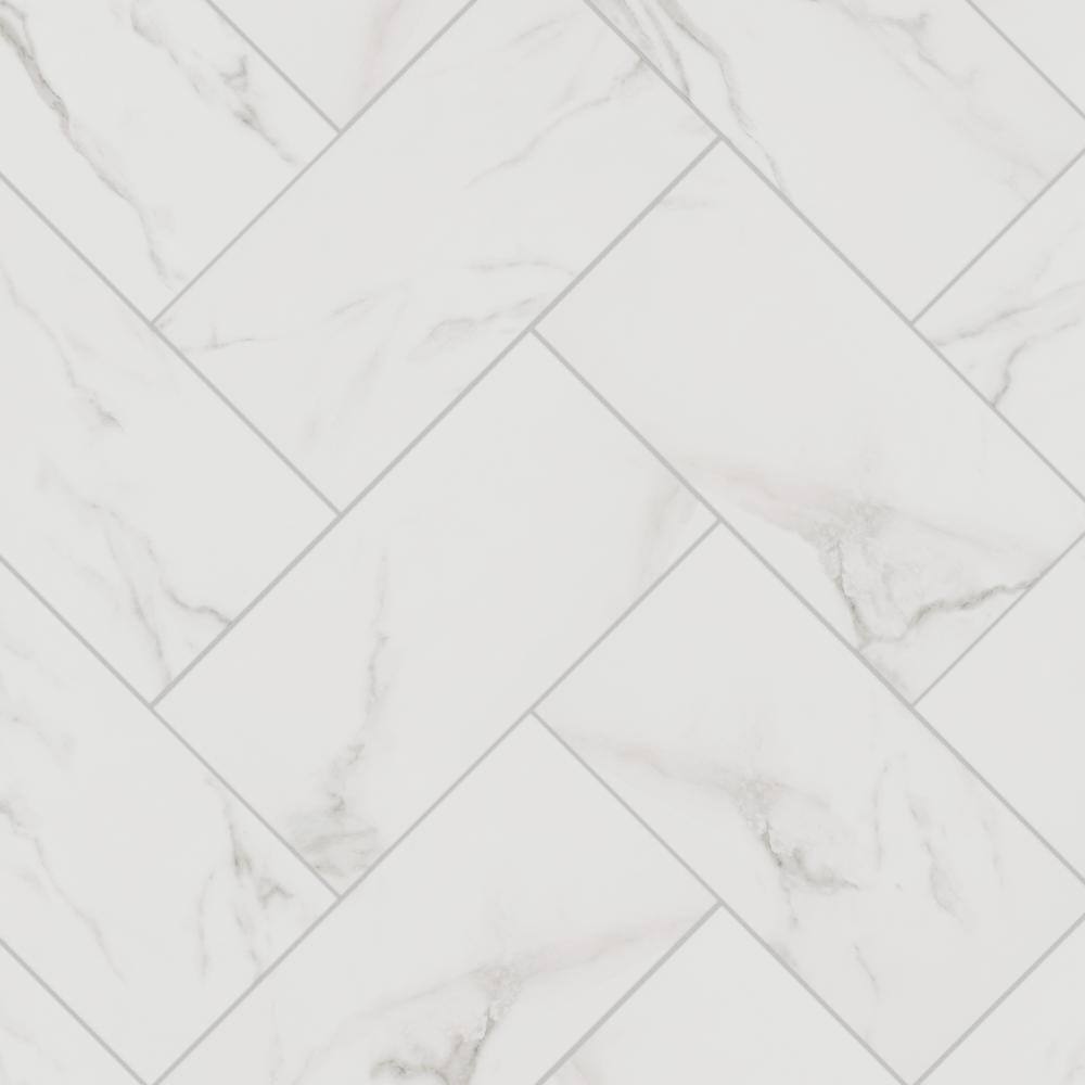 Florida Tile Home Collection Michelangelo Calacatta Rectified 12 in. x 24 in. Porcelain Floor and Wall Tile (13.3 sq. ft. case) CHDEZEN1012X24