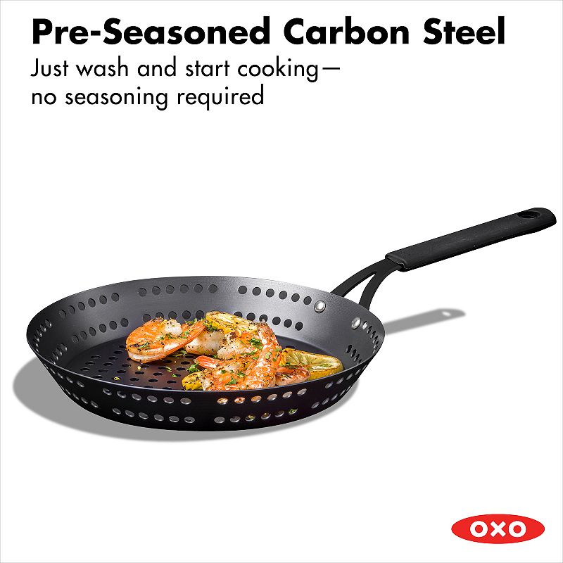 OXO Obsidian Pre-Seasoned Carbon Steel 12-in. Frypan with Holes for Grilling with Removable Silicone Handle Holder