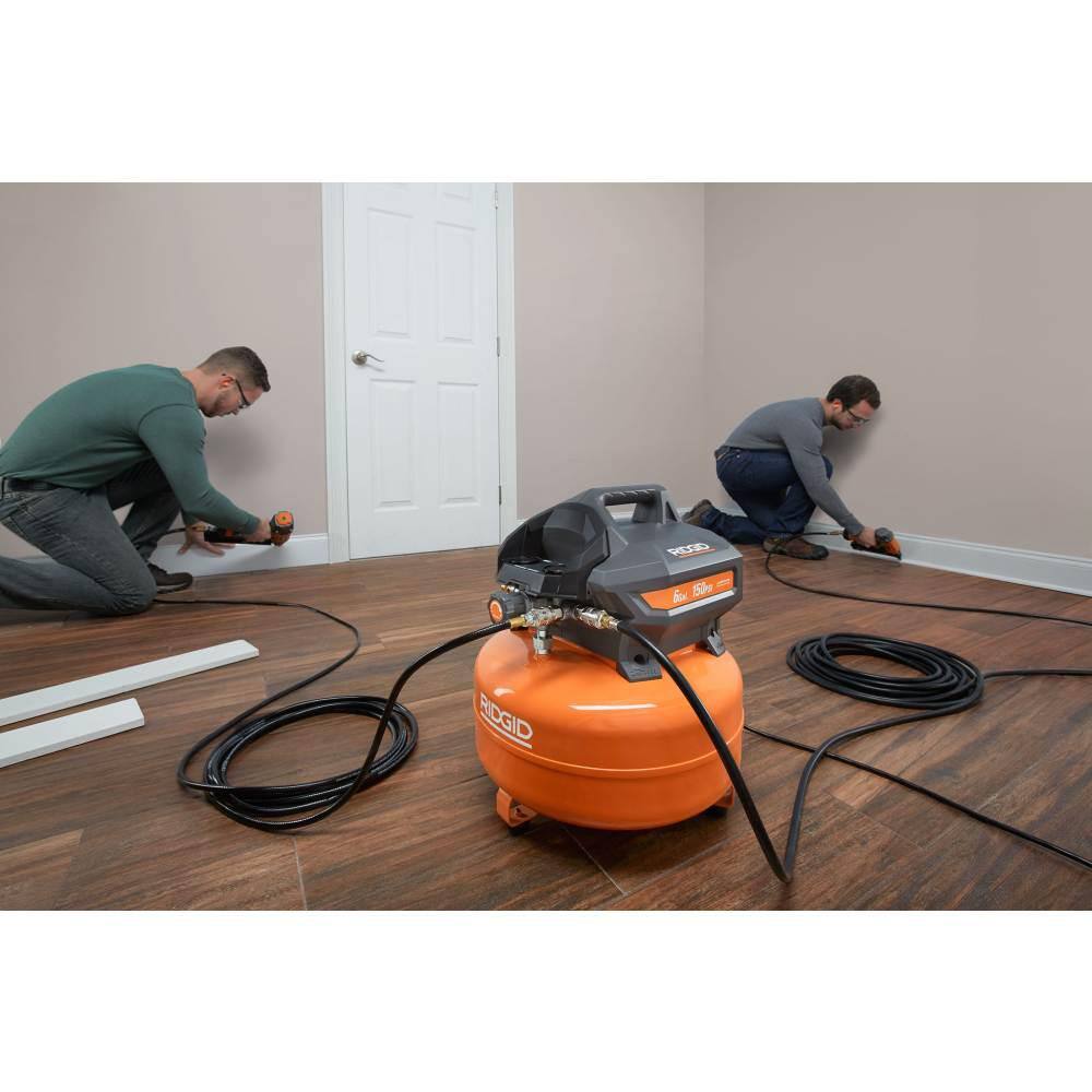 RIDGID 6 Gal. Portable Electric Pancake Air Compressor with 14 in. 50 ft. Lay Flat Air Hose OF60150HB-R5025LF