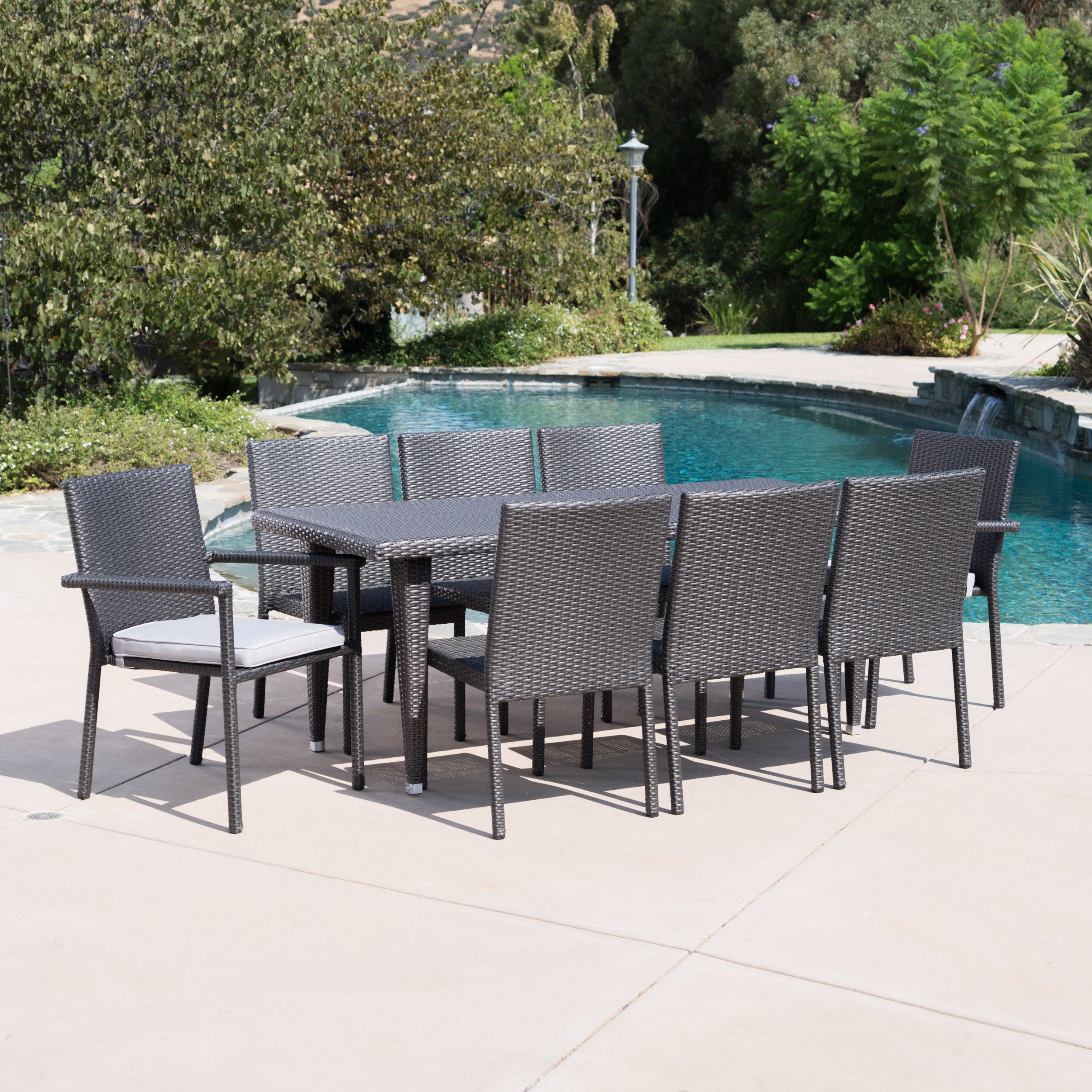 Grand Outdoor 9 Piece Wicker Dining Set with Water Resistant Cushions