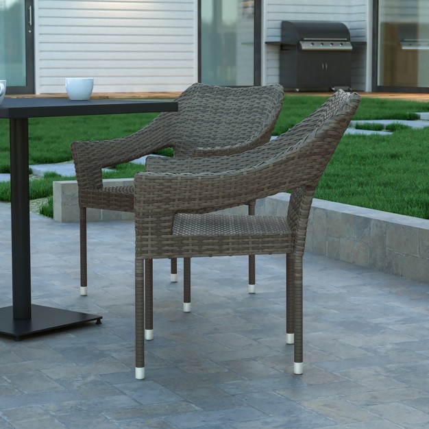 Emma And Oliver All weather Indoor outdoor Stacking Patio Dining Chair With Steel Frame And Weather Resistant Pe Rattan