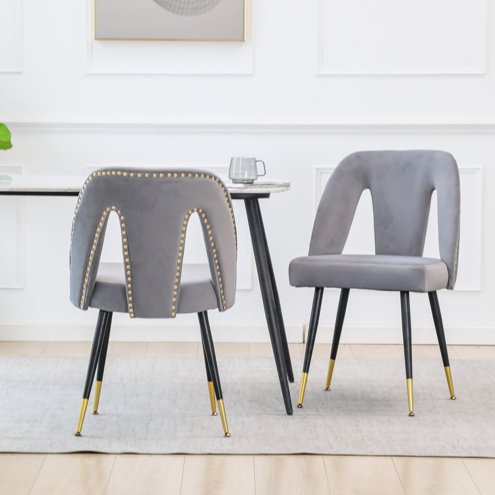 Contemporary Velvet Upholstered Dining Chair with Nailheads and Gold Tipped Black Metal Legs Set of 2