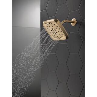 Delta 4-Spray Patterns 1.75 GPM 7.69 in. Wall Mount Fixed Shower Head with H2Okinetic in Lumicoat Champagne Bronze 52460-CZ-PR