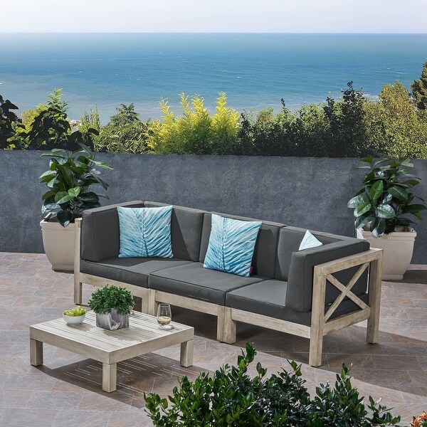 Brava Outdoor 3Seater Acacia Wood Sectional Sofa Set with Coffee Table and Cushions by Christopher Knight Home