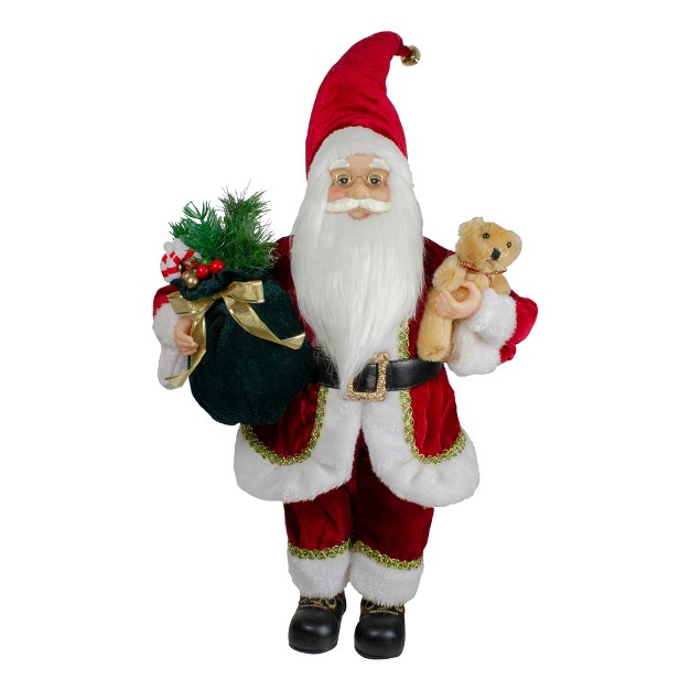 Standing Santa Christmas Figure With A Plush Bear