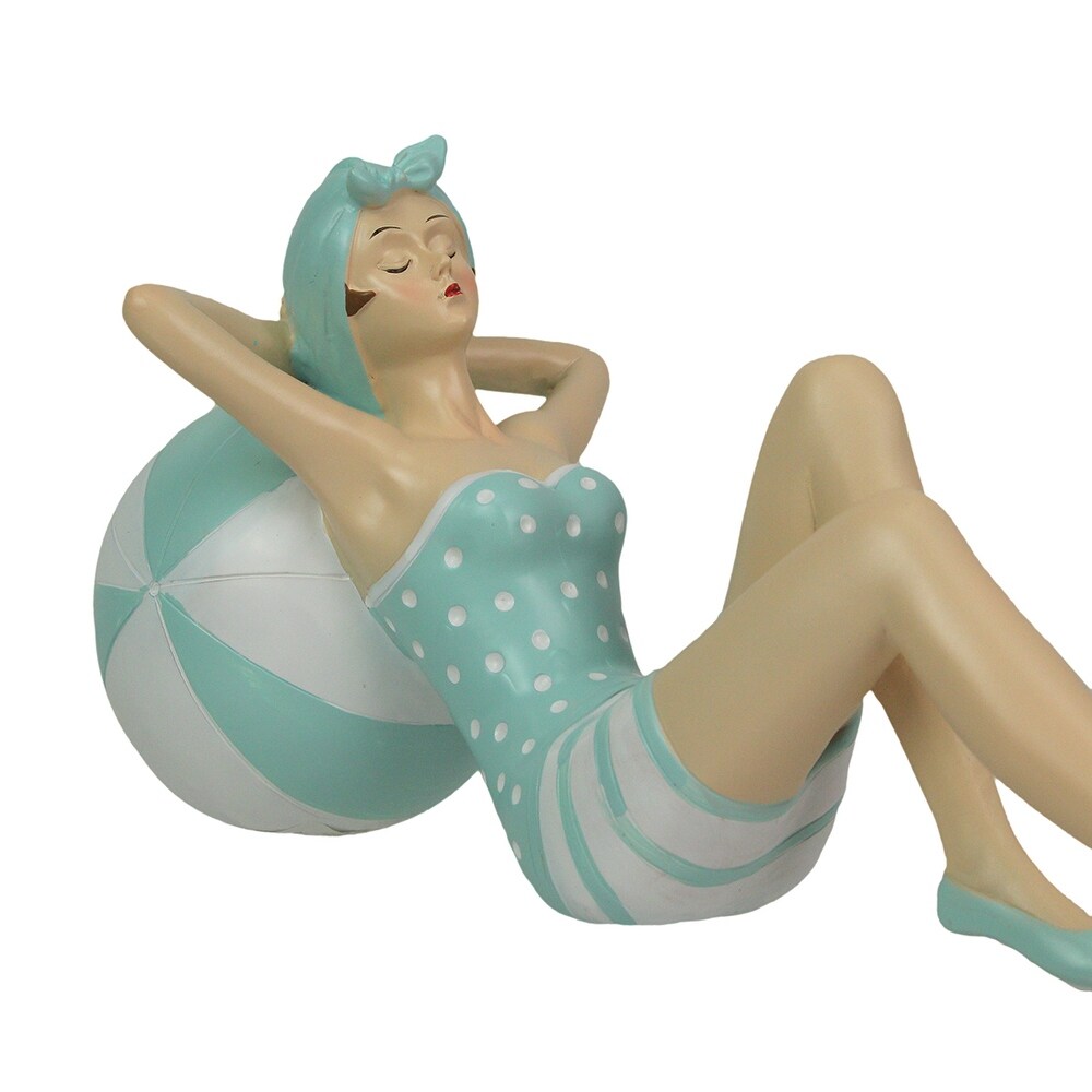 Retro Beach Girl Laying On Beach Ball In Blue Swimsuit Statue   5.5 X 11.75 X 5 inches