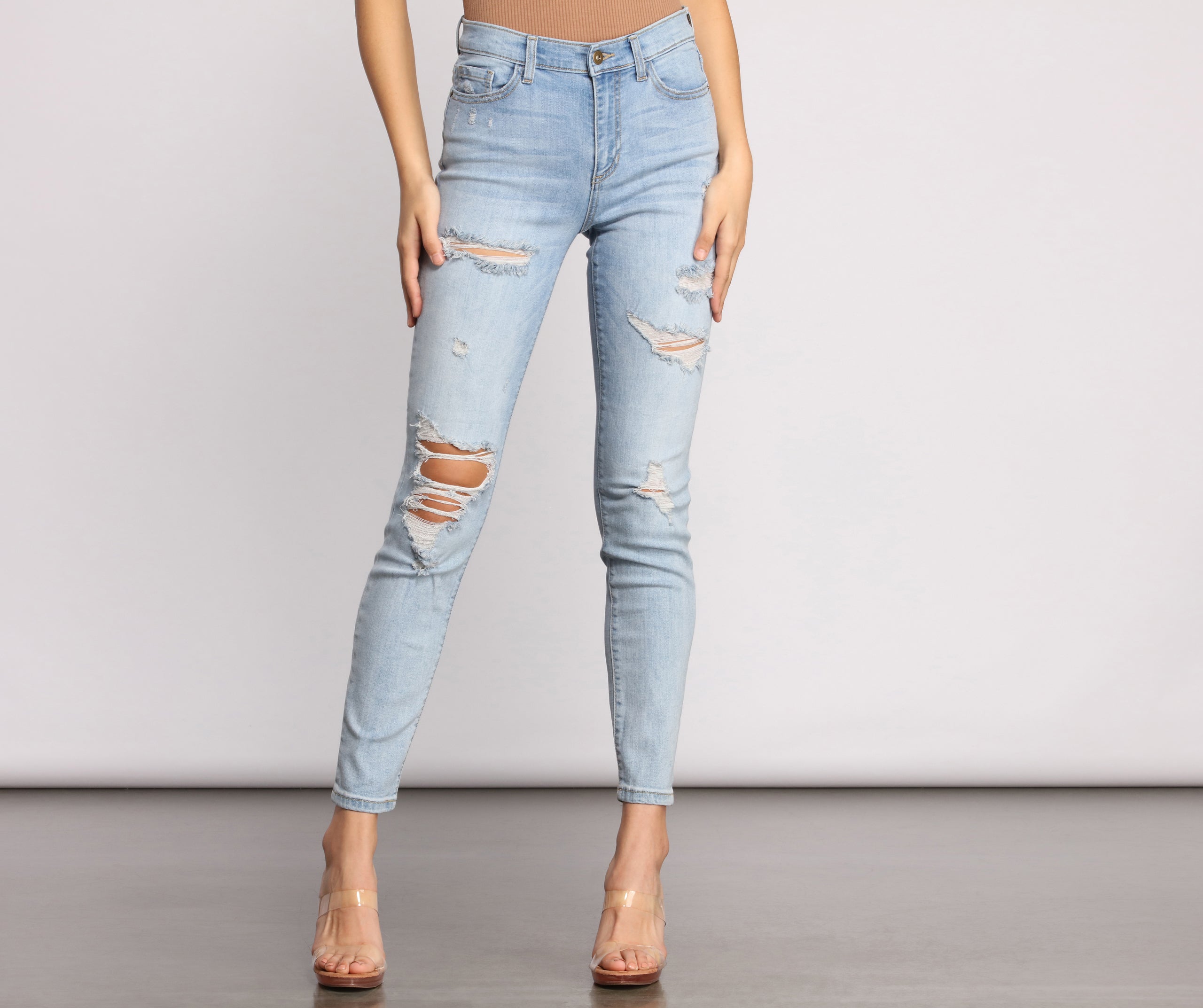 Mid Rise Destructed Skinny Jeans