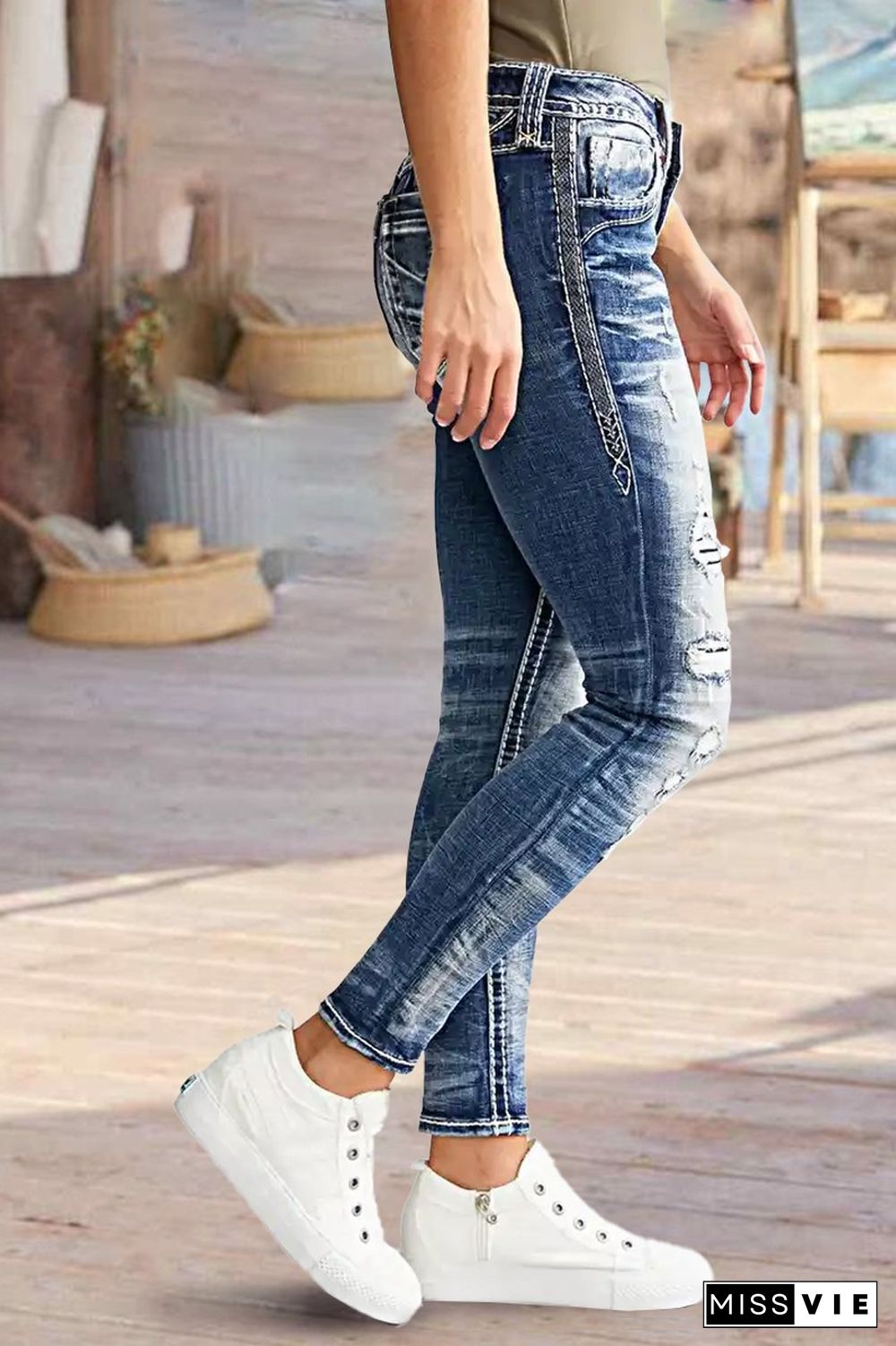 Ripped Mid Rise Skinny Jeans