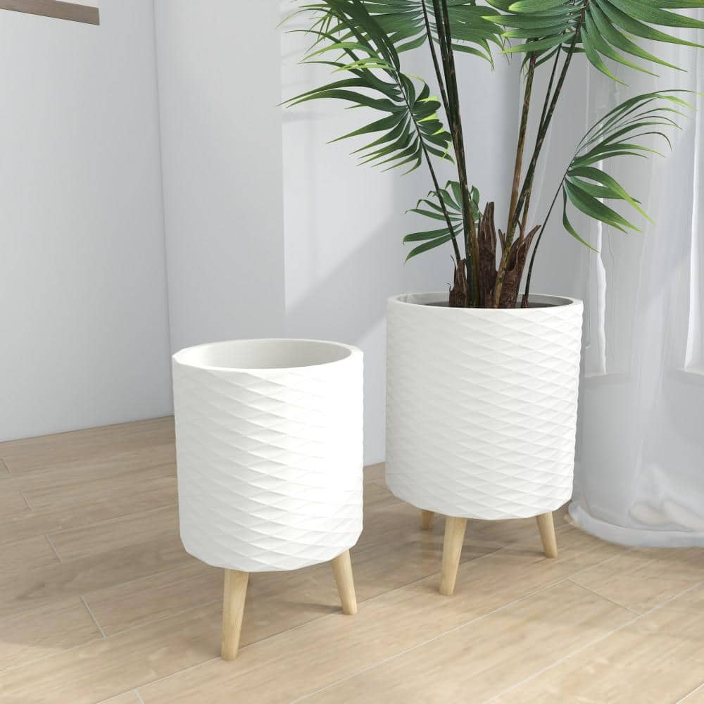 Litton Lane 14 in. and 16 in. White Textured Round Fiberclay Planters (Set of 2) 46500