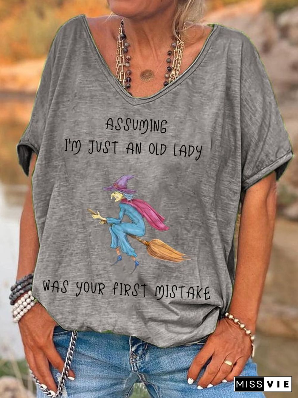 Women's Funny Witch Assuming I'm Just An Old Lady Was Your First Mistake Halloween V-Neck Tee