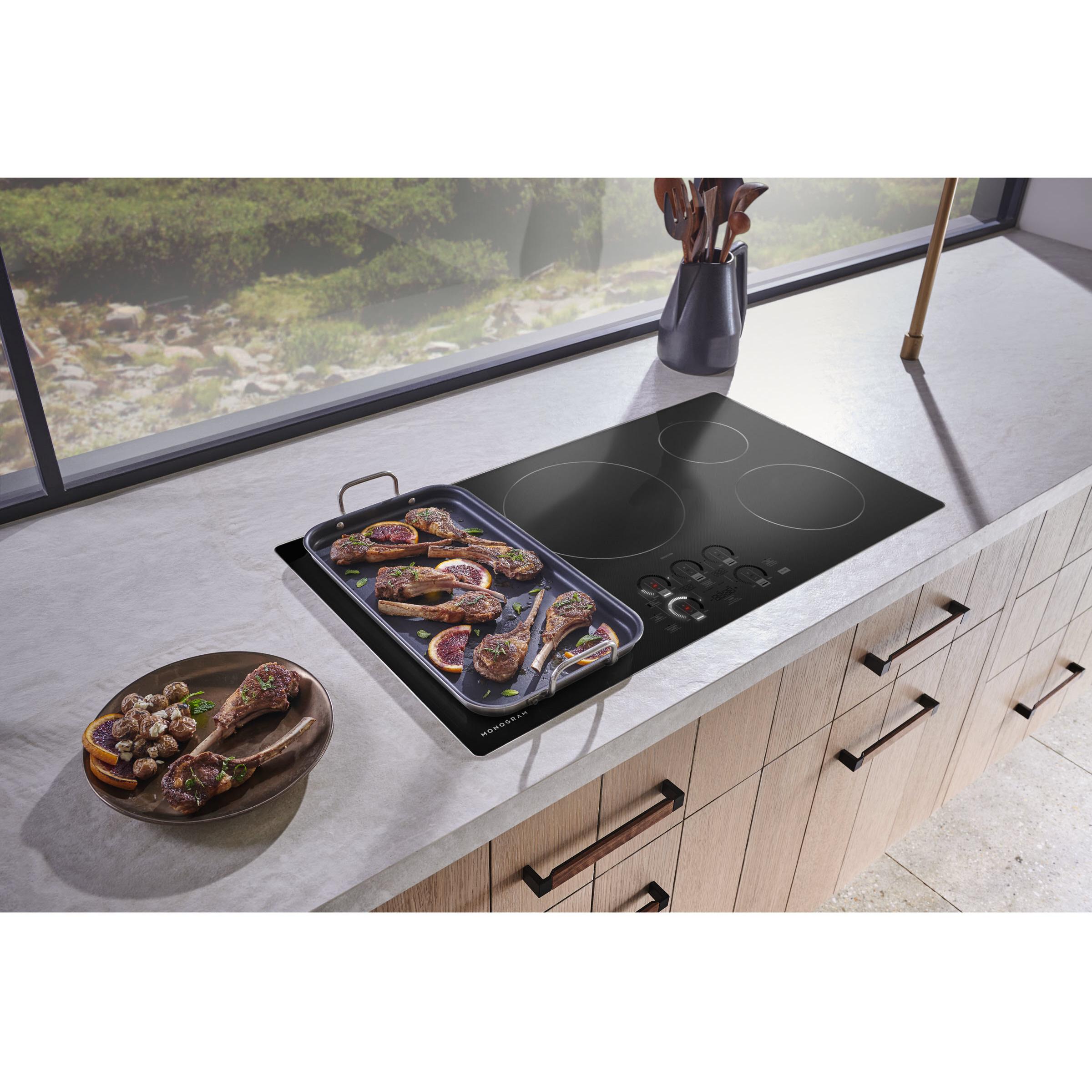 Monogram 36-inch Built-in Induction Cooktop with Wi-Fi Connect ZHU36RDTBB