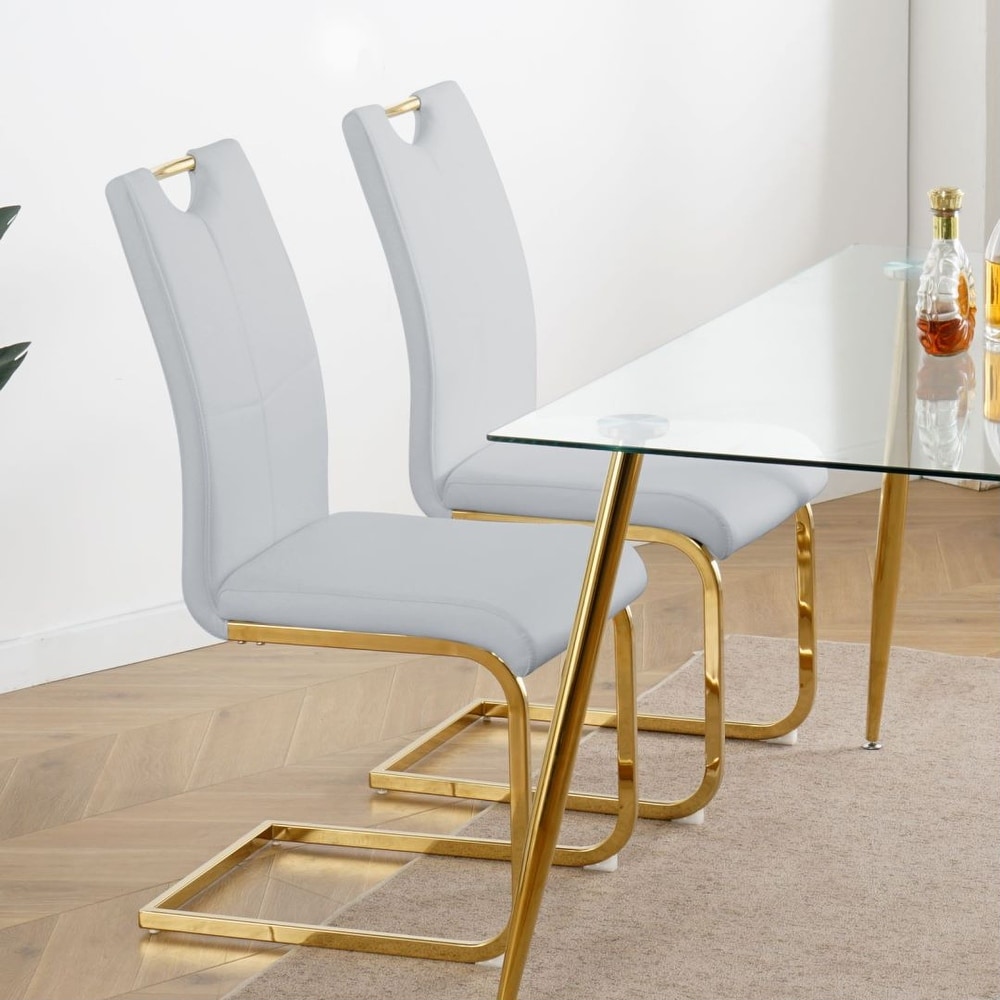 Modern Dining Chairs with Faux Leather Padded Seat and gold Metal Legs Set of 4