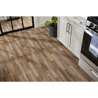 TrafficMaster Autumn Brown Oak Residential Vinyl Sheet Flooring 12 ft. Wide x Cut to Length U9160405K743G14