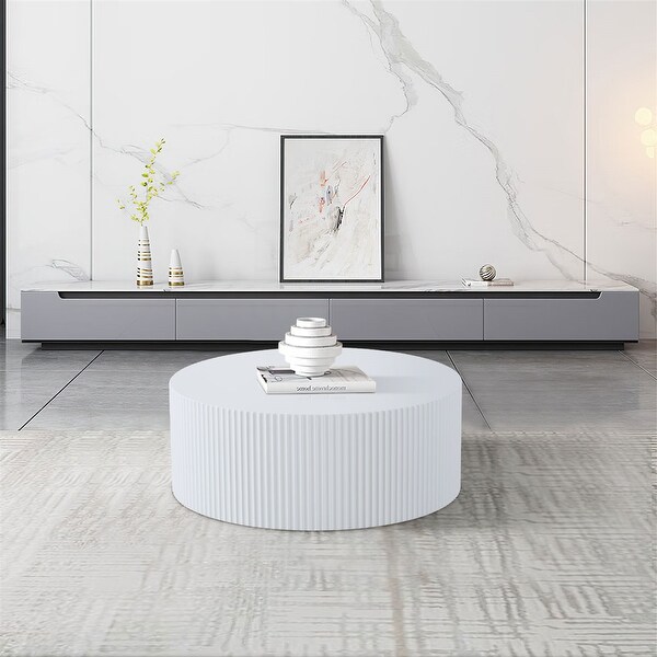 Contemporary Round Coffee Table with Handcrafted Relief