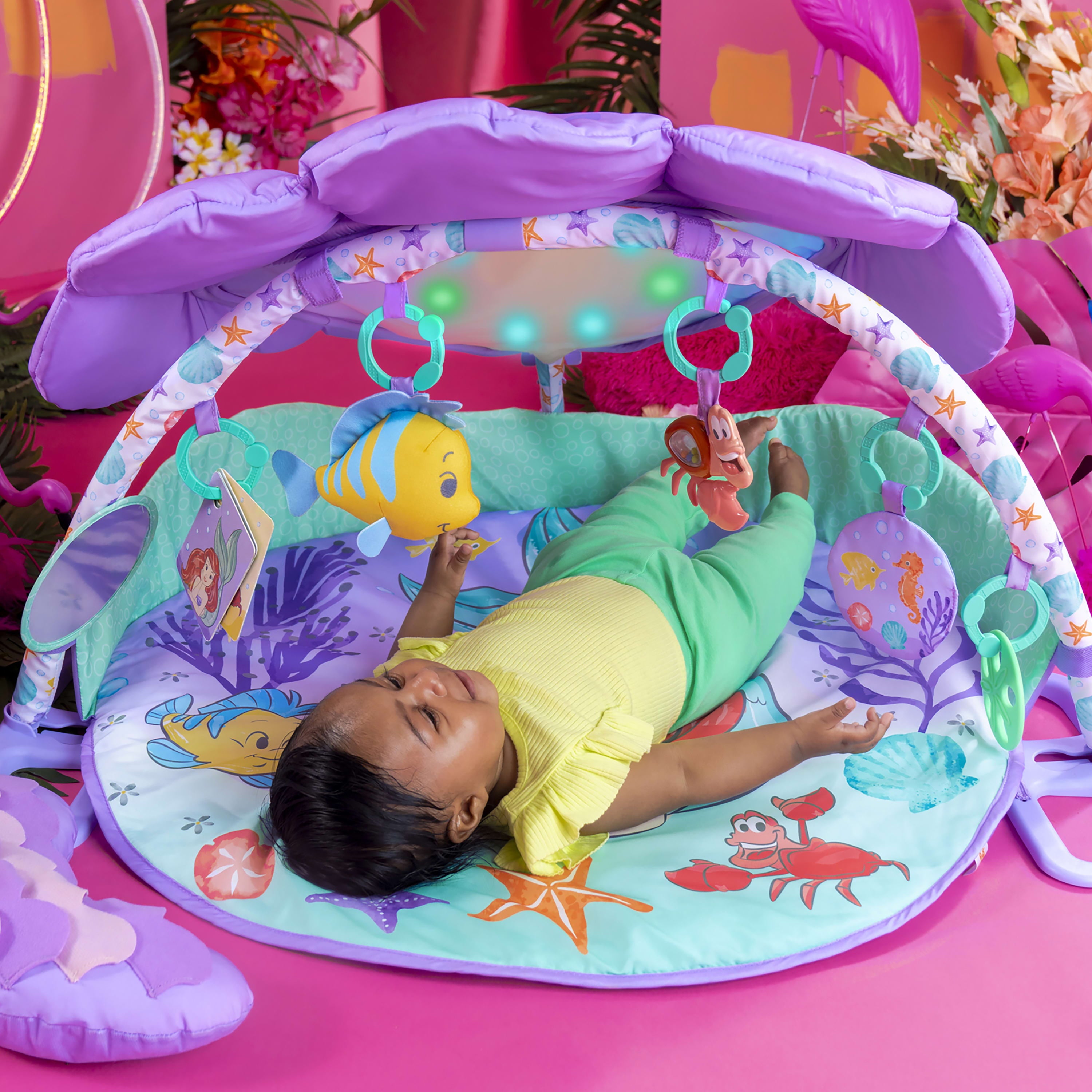 Bright Starts The Little Mermaid Twinkle Trove Light-Up Musical Baby Activity Gym with Tummy Time Pillow， Newborn+