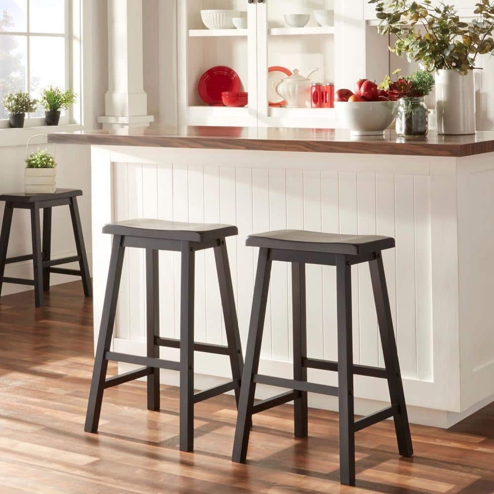 HomeSullivan 29 in. Vulcan Black Saddle Seat Bar Height Backless Stools (Set Of 2) 405302V-29