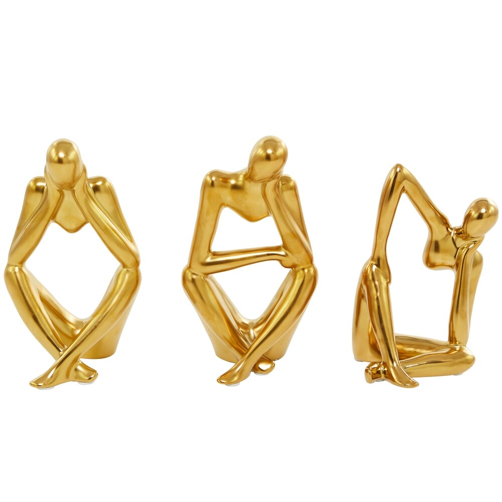 CosmoLiving by Cosmopolitan Silver or Gold Porcelain Sitting Thinker People Sculpture (Set of 3)