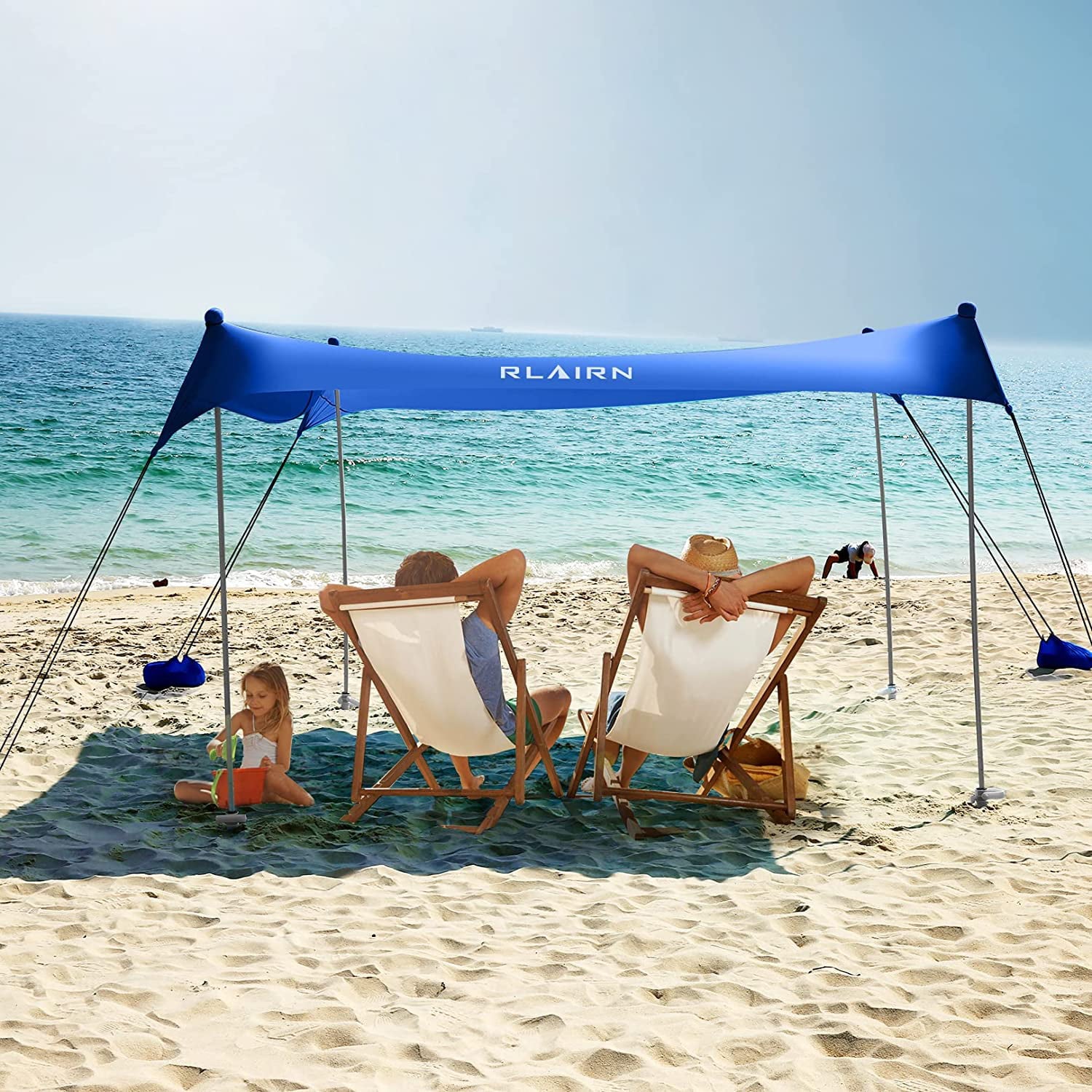 RLAIRN 10 x 10 ft Pop up Beach Tent Sun Shelter， UPF50+ Rain Resistant Beach Canopy Tent Gazebo Shade with 4 Foldable Poles， Sand Bag， Sand Shovel and Carry Bag for Beach and Backyard，Deep Blue