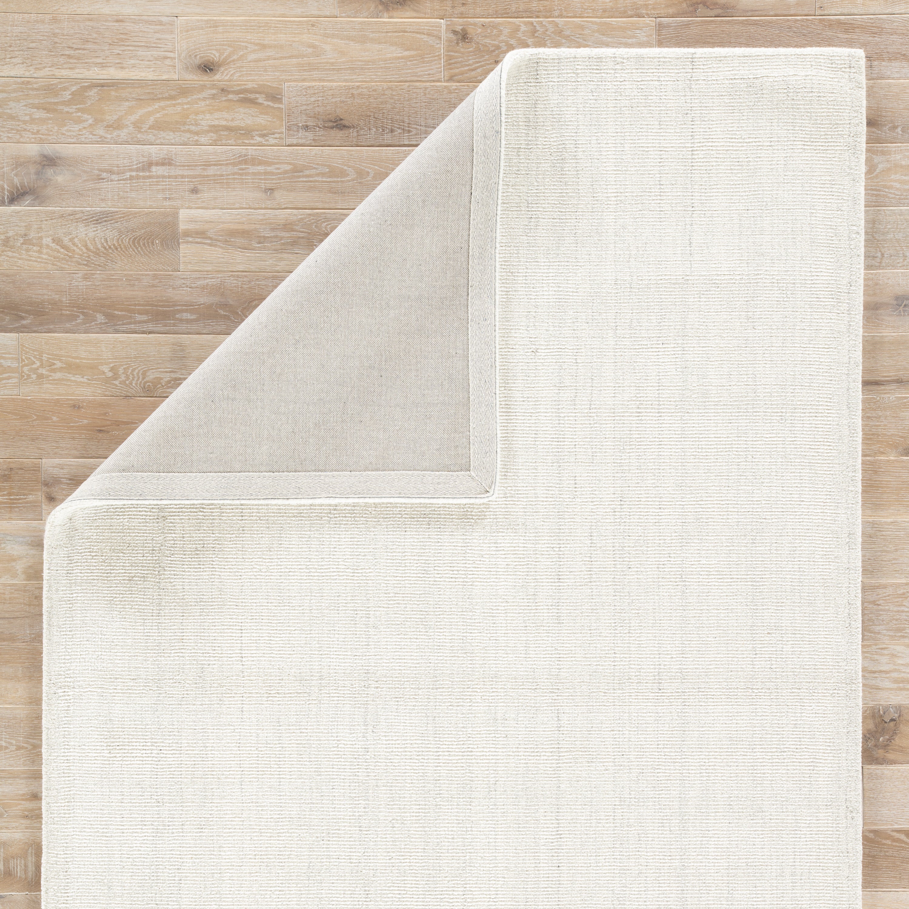 Kelle Handmade Solid White & Gray Area Rug