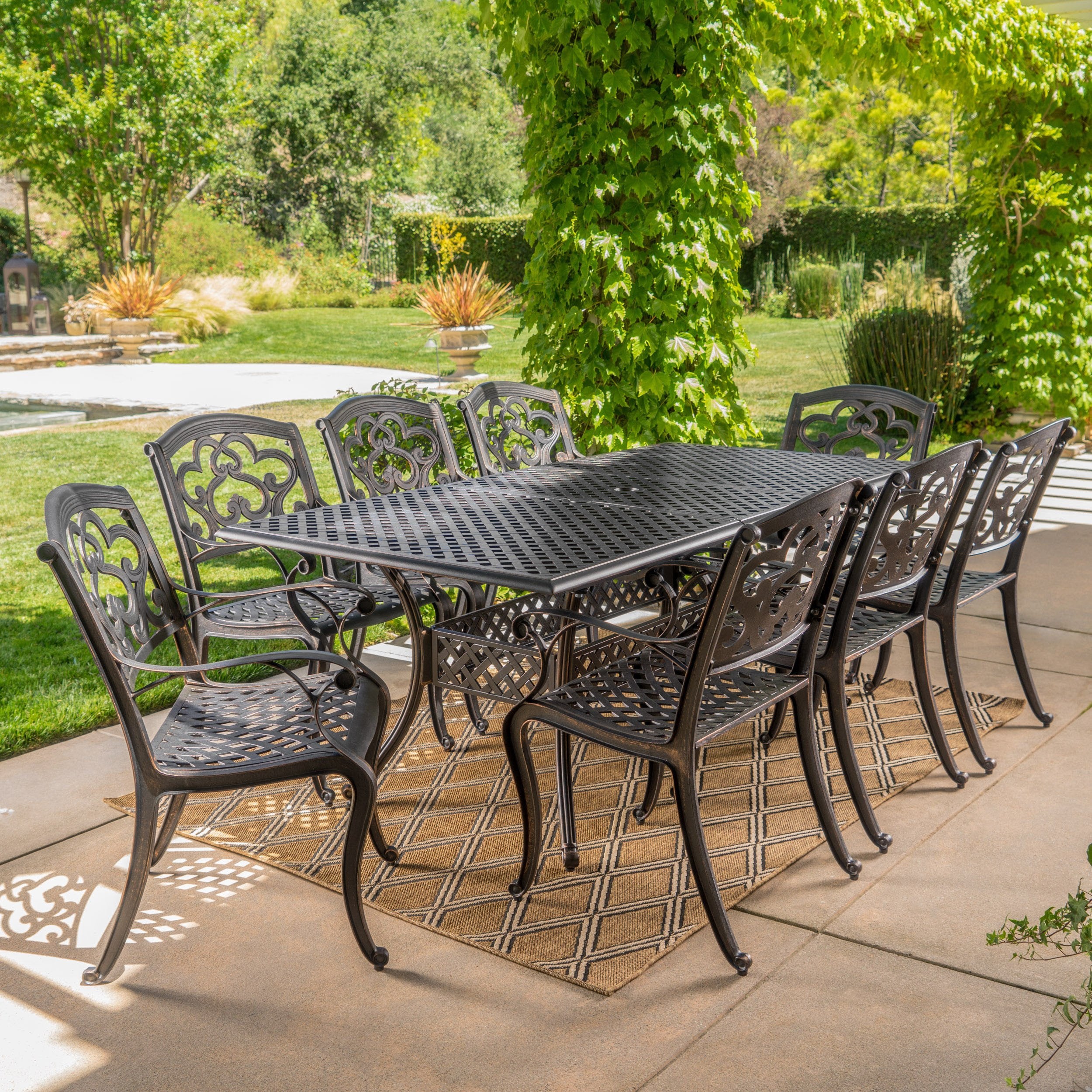 Ariel Outdoor 9 Piece Patina Copper Finish Cast Aluminum Dining Set