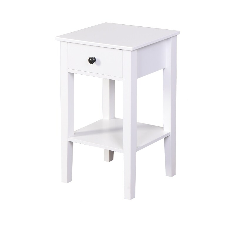 The white bathroom floor to ceiling storage table has a drawer