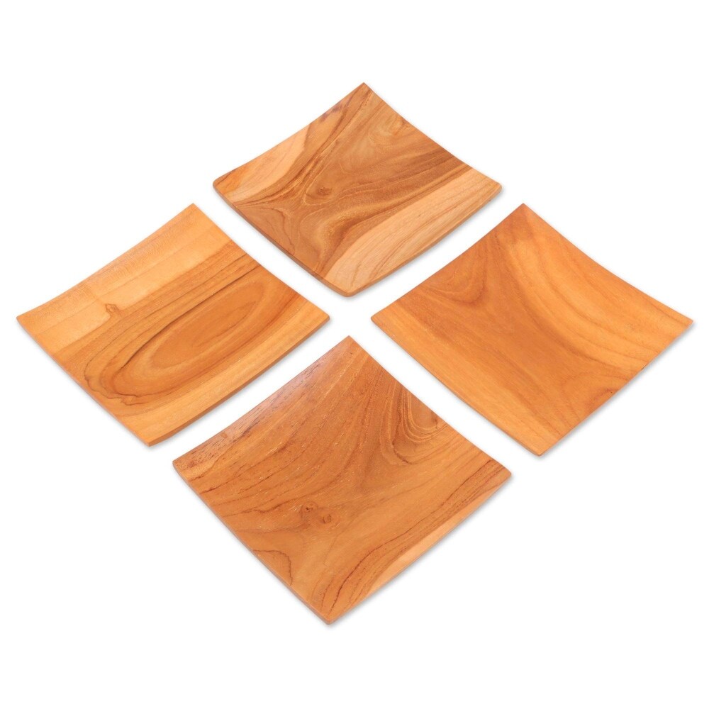 NOVICA Teakwood plates  'Fine Meal' (set of 4)