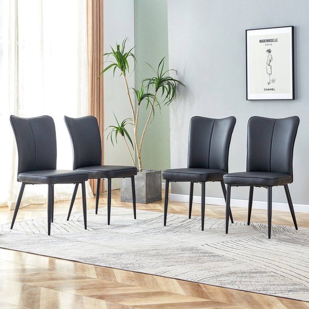 Modern dining chairs. 4 piece set of light gray PU seats with black metal legs. Suitable for restaurants  living rooms