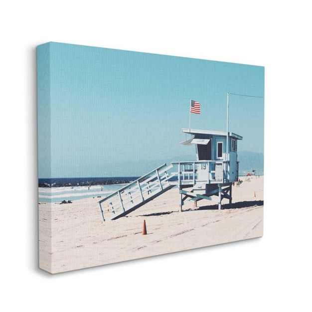 Stupell Industries Blue Lifeguard Stand At Coastline American Flag Gallery Wrapped Canvas Wall Art 16 X 20