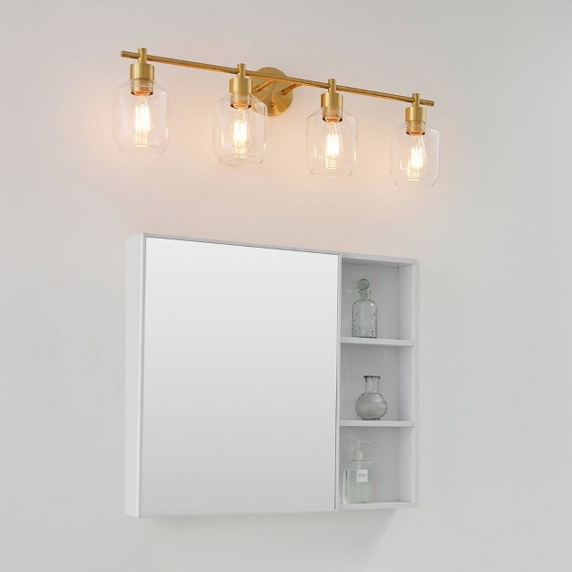 Cannes 4 light Matte Brass Vanity Light With Clear Glass Shades Globe Electric