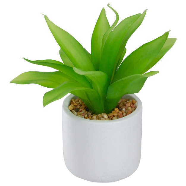 Green Artificial Aloe Plant In A White Pot