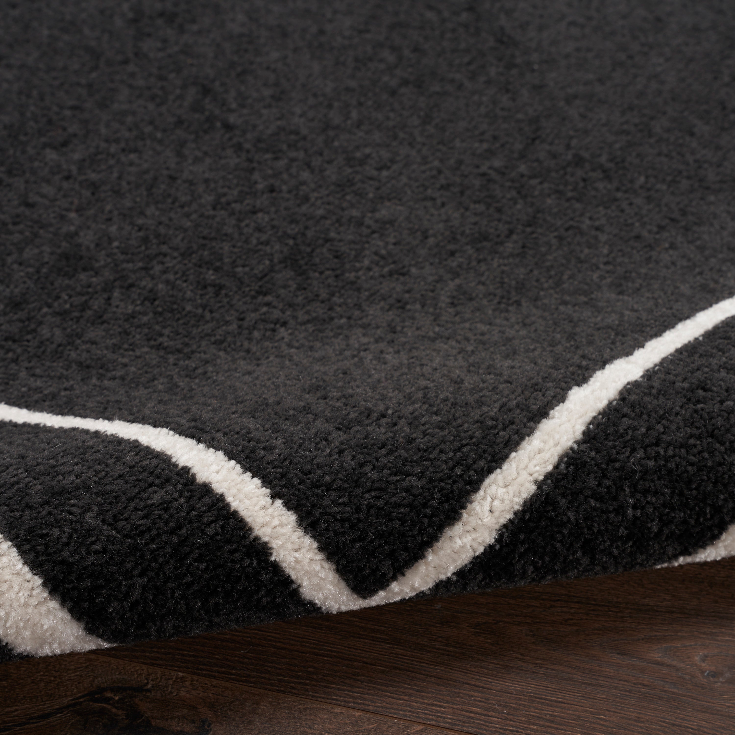 Nourison Essentials Black Ivory Rug