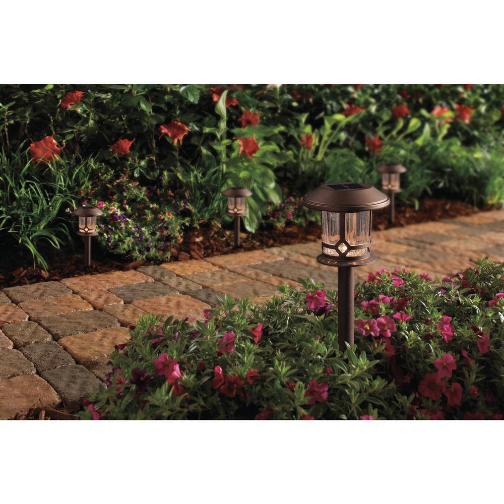 Hampton Bay 18 Lumens Golden Bronze Integrated LED Solar Outdoor Pathway Light Warm White (4-Pack) TW0335A