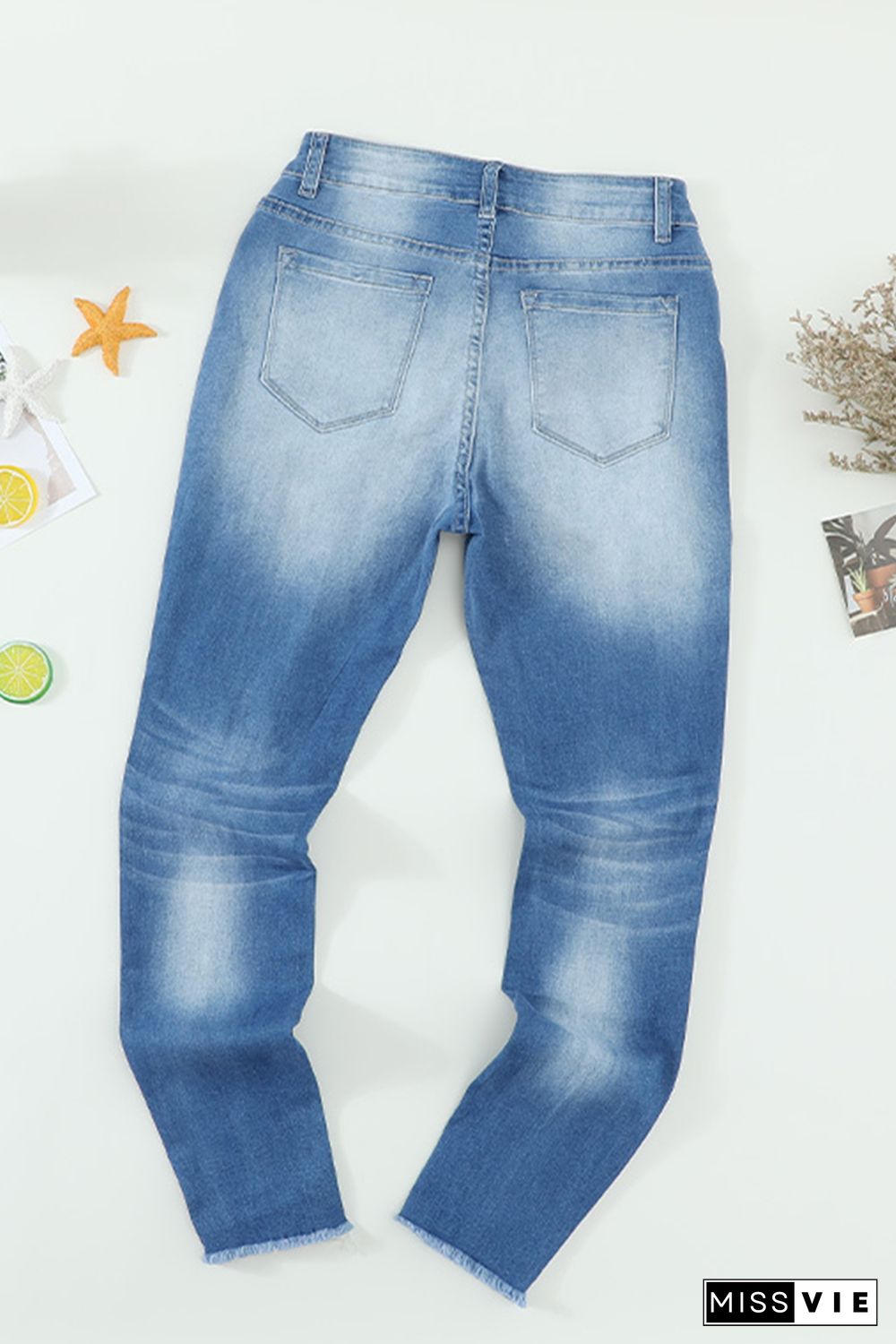 Faded Mid High Rise Jeans with Holes