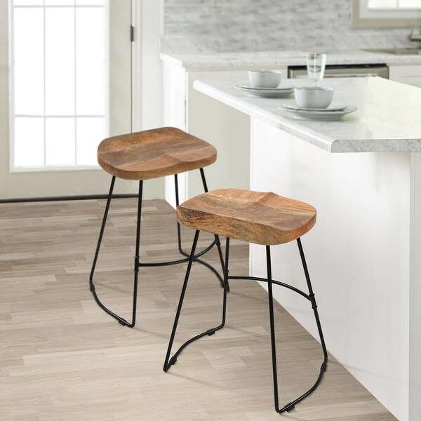 Tiva 24 Inch Handcrafted Backless Counter Height Stool， Brown Mango Wood Saddle Seat， Black Metal Base