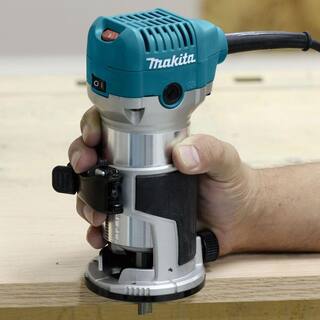 Makita 6.5 Amp 1-14 HP Corded Plunge Base Variable Speed Compact Router Kit With Collet Base Straight Guide (2) Wrenches RT0701CX7