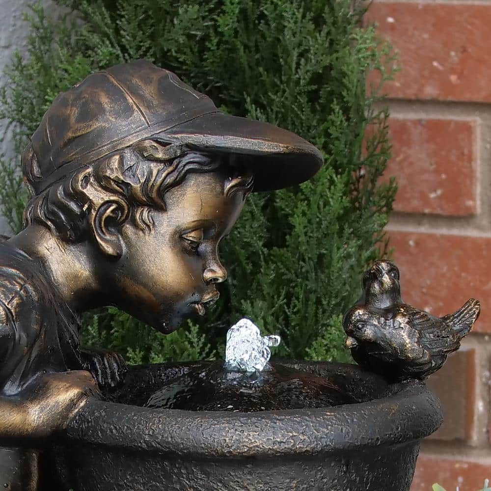 Alpine Corporation 27 in. Tall Indoor/Outdoor Boy Drinking From Water Fountain with LED Lights, Bronze GXT740